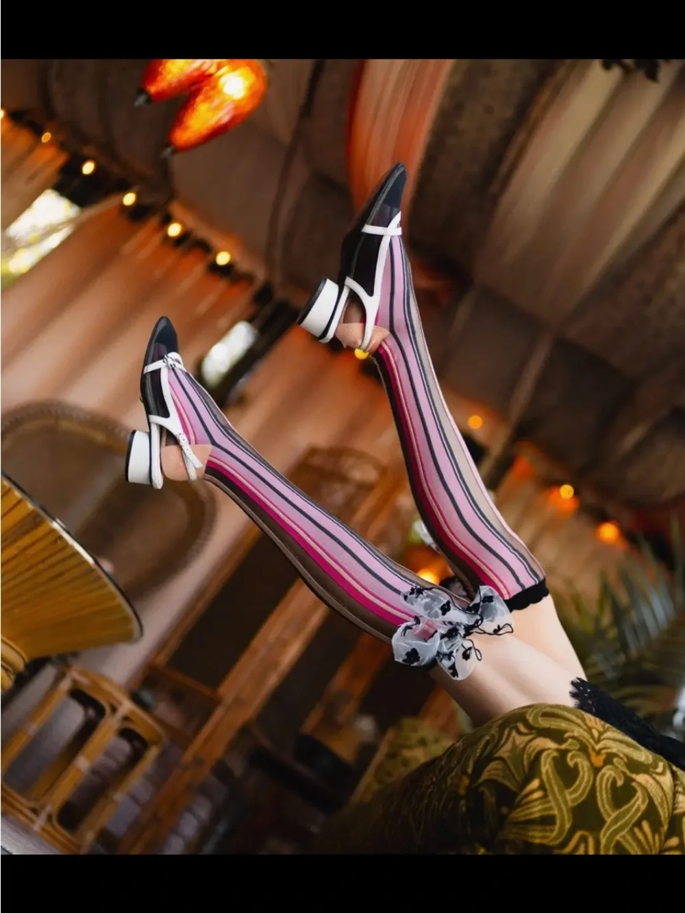 Sock Candy Parision Pink Striped Knee-High Socks with Floral Bow Accent.